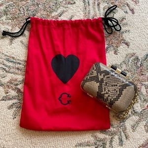 C. Wonder Mini Clutch